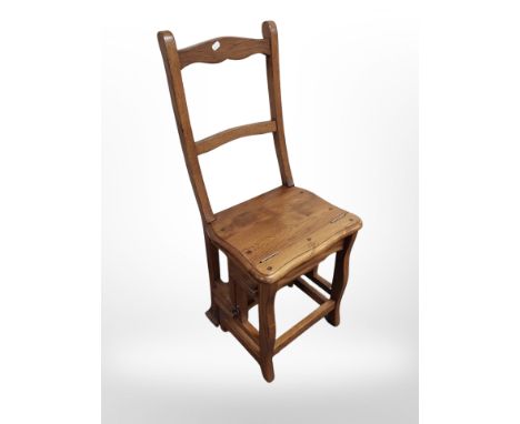 A reproduction oak metamorphic library step chair 