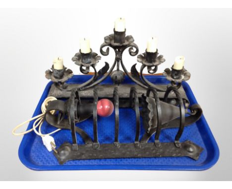 A wrought iron five sconce candle holder and further wall light 
