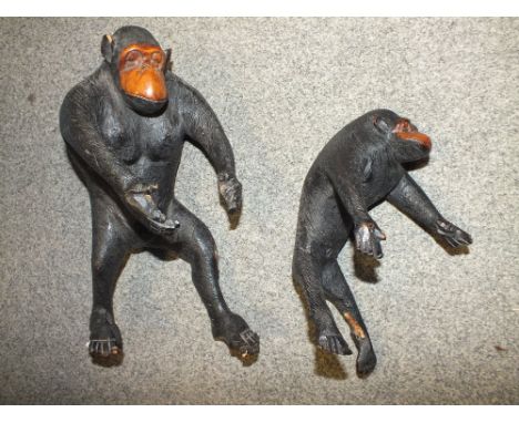 TWO VINTAGE CARVED WOODEN GUERILLA FIGURES