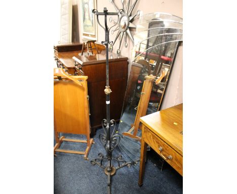 AN ANTIQUE EXTENDING LAMP STANDARD