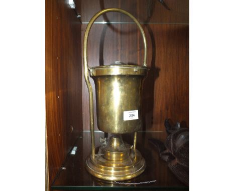 AN UNUSUAL BRASS COMBINATION HEATER LAMP 