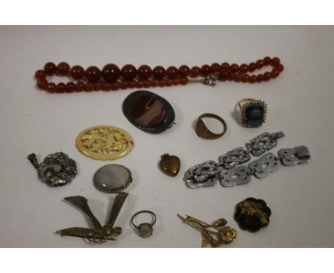 A BAG OF VINTAGE COSTUME JEWELLERY 