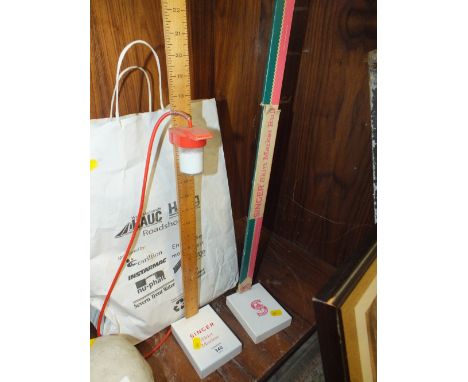 TWO VINTAGE SINGER SKIRT MARKERS AND A BAG OF SHEET MUSIC 