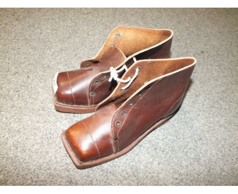 A PAIR OF VINTAGE LEATHER BOOTS
