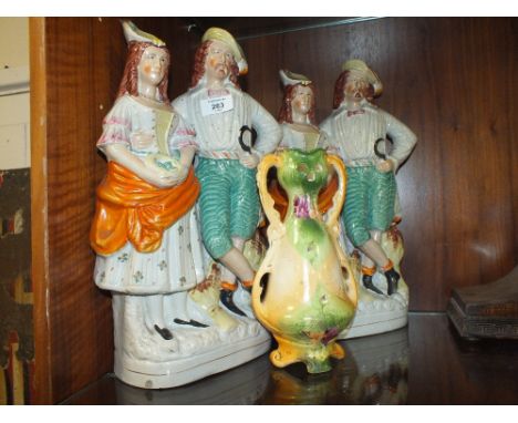 A PAIR OF STAFFORDSHIRE FLATBACK GROUP FIGURES TOGETHER WITH A VASE