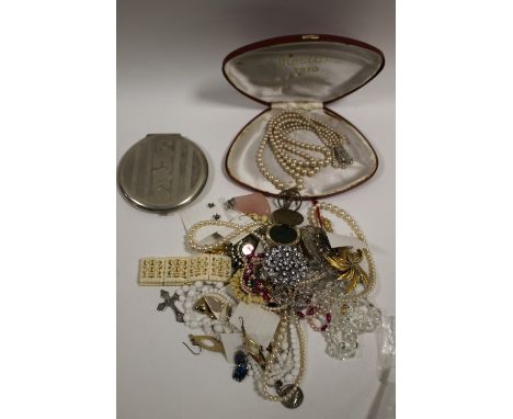 A BAG OF VINTAGE COSTUME JEWELLERY