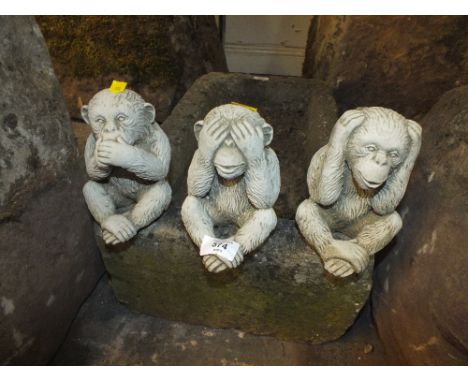 A SET OF THREE WISE MONKEY STONE FIGURES