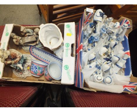 A TRAY OF BLUE AND WHITE CERAMIC FIGURES TOGETHER WITH A TRAY OF ASSORTED CERAMICS