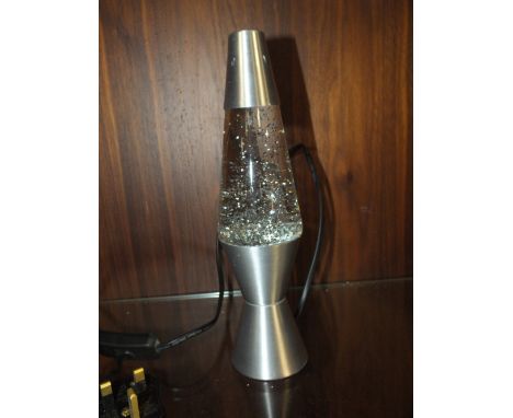 A BOXED MINIATURE LAVA LAMP 