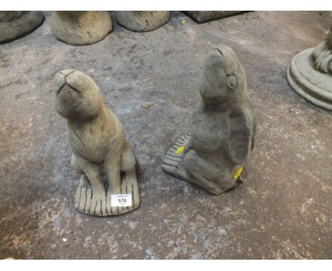 A PAIR OF SMALL MOON GAZING HARE FIGURES