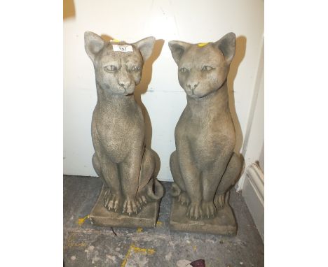 A PAIR OF STONE CAT FIGURES