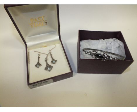 A BOXED PAST TIMES BANGLE AND PENDANT AND EARRINGS SET
