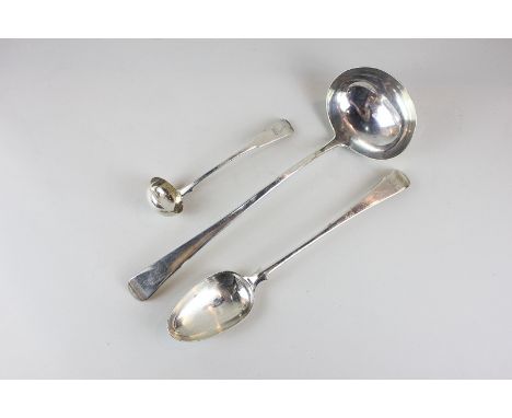 A George III silver ladle, London 1799, a George III silver serving spoon, London 1766, maker Thomas Dene, and a Victorian to