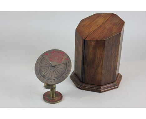 A portable brass sundial stamped Lindisfarne Sundials, with inscription Patrick Moore, Royal Astronomical Society 2000, 12cm 