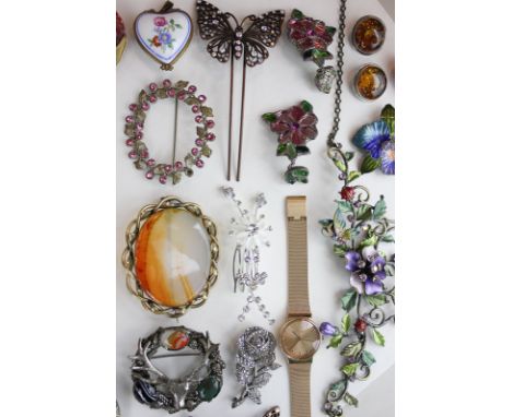 A floral enamel and paste set necklace, a collection of costume jewellery including brooches, earrings, a Skaagen watch, silv