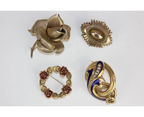 A Victorian gold enamel and pearl brooch, a gold brooch with glazed hair compartment, a gold plated rose brooch, a 9 carat tw
