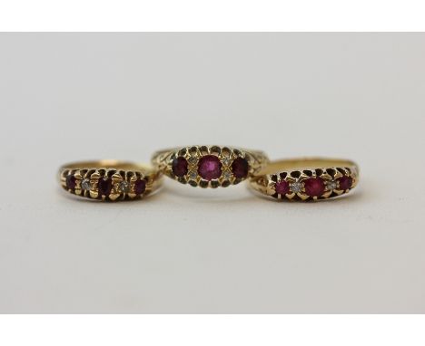 A ruby and diamond five stone ring; and another similar and a ruby three stone ring with pairs of small old cuts between