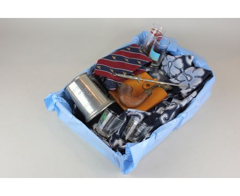 A box of Sir Patrick Moore memorabilia, to include a Hawaiian shirt, pewter mug, purse, pipe, tie, paperweight, letter opener