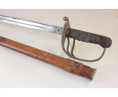 A George V Army Service Corp officer's sword with 85cm etched straight blade in leather scabbard, (SPM)