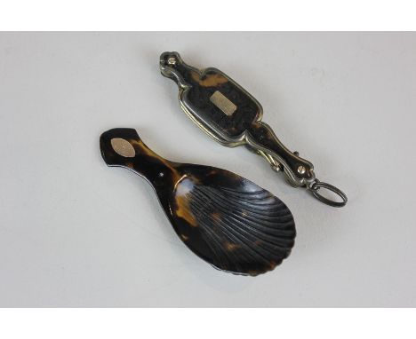 A tortoiseshell caddy spoon with unmarked yellow gold monogrammed inlay, together with a pair of gold plated tortoiseshell fo