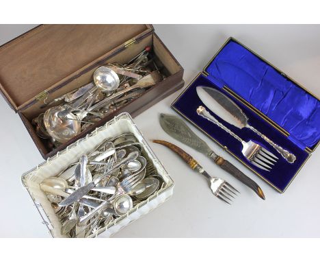 A pair of horn handled silver plated fish servers, a cased set of silver plated fish servers and a large selection of silver 