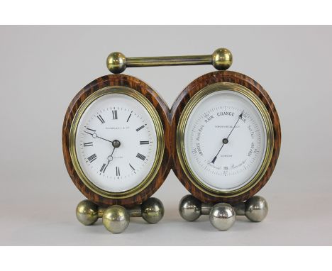 A Thornhill & Co clock and barometer in a shared simulated walnut case on ball feet