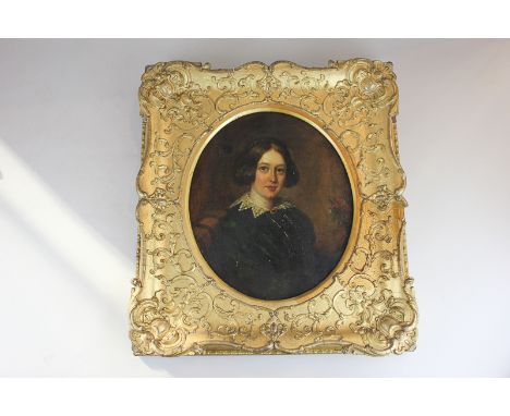 19th century school, portrait of a seated lady, oil on canvas, oval mount, 32cm by 27cm