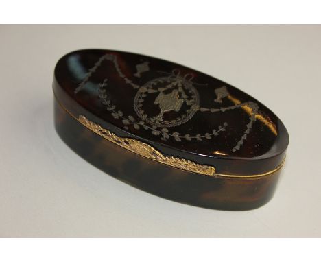 A gilt metal and silver inlaid tortoiseshell snuff box navette shaped, circa 1790