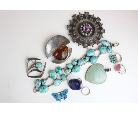 Silver mounted jewellery comprising a David Andersen brooch, four rings, a plaid brooch, an amber brooch, turquoise bracelet,