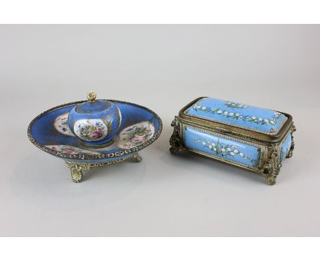 A Continental porcelain inkwell with hand painted floral panels surrounded by bright blue ground and gilt borders, Sevres mar