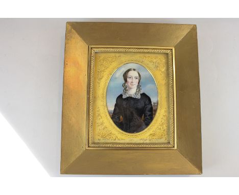 19th century portrait miniature of a lady in black dress with hair in ringlets, oval mount, ,12cm by 9cm