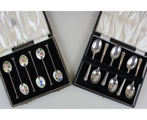 A cased set of Elizabeth II silver coffee spoons with floral enamel backs, Birmingham 1957, together with a cased set of silv