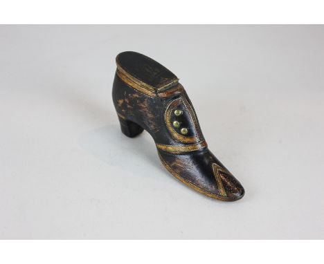 A Victorian mahogany snuff box modelled as a lady's shoe, with brass inlay and ebonised finish