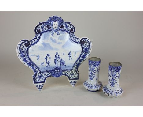 A pair of 18th century Delftware vases, 11cm high, signature to base, together with a Delftware wall plaque depicting ice ska