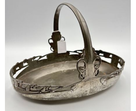 Liberty of London Tudric pewter cake basket designed by Archibald Knox, shape number. 0359 Height - 15.5cmLength - 23cm
