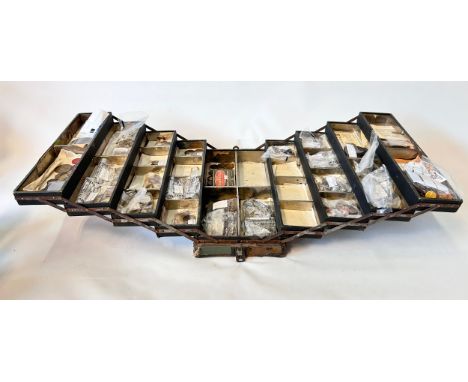 A mixed All World collection of coins in a large cantilever sewing box, including; trade and transport tokens in bronze, bras