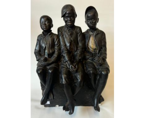 Goldscheider, figure group, three boys seated on a brick wall, plaster