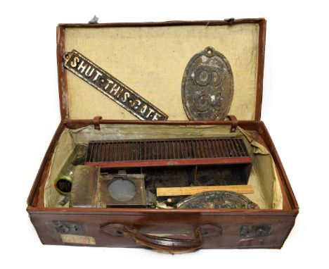Railwayana including two NER bridge plates 63 and 69; NER wall mounted letter rack; NER Cash bag (or similar) brass station t