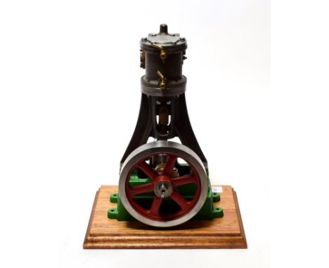 Stuart No.4 Stationary Engine  with single upright cylinder and fly wheel, on wooden base 10'', 26cm high