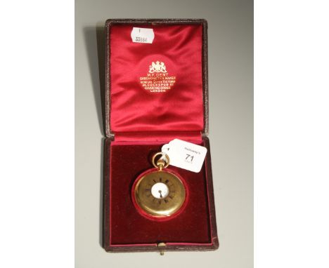 Dent. An Edwardian 18ct gold half hunting cased pocket watch with enamelled outer chapter ring, white enamel dial, Roman nume