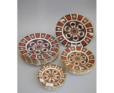 A set of ten Royal Crown Derby 27cm diameter plates, together with nine conforming 21cm plates and seven 16cm plates, each ty