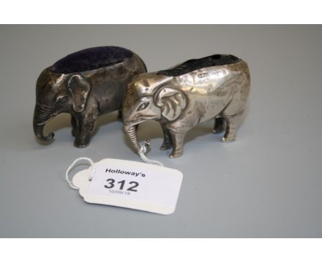 A large Edwardian silver novelty pin cushion, in the form of an elephant, Birmingham 1905, maker's marks rubbed, 6cm, togethe