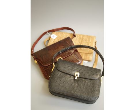 A lady's vintage ostrich hide handbag, a crocodile handbag and one other