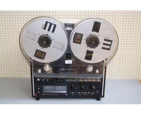 Teac, an X-1000R open reel to reel stereo tape deck, with manual and other paperwork