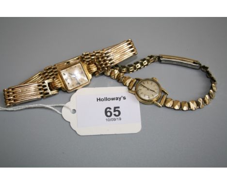 Eberhard. A lady's Swiss 18ct gold wristwatch, rectangular with reeded 6 lugs and articulated gate link bracelet together wit