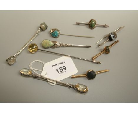 Attributed to Bernard Instone, a double ended citrine cloak pin, another set with moss agate and a hardstone cloak pin, toget