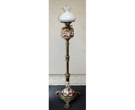 A late 19th century American brass and ceramic standard oil lamp with Duplex burner