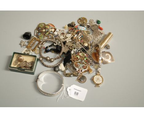 A gold mounted shell cameo brooch pendant, two gold and enamel heart pendants, a silver bangle and a quantity of silver and w