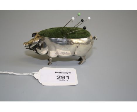 An Edwardian silver novelty pin cushion, in the form of a rotund pig, Birmingham 1906?, maker not found, 9cm long