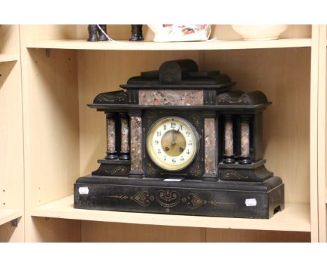 A Victorian black slate and marble mantle clock, the architectural  four column case enclosing an eight day gong striking mov